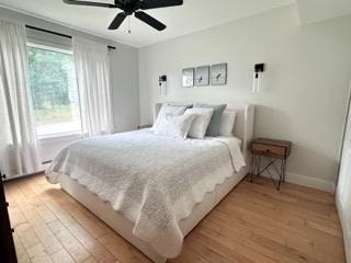 35 Parham Road Tyngsboro, MA 01879 - Photo 15 of 42 a large bed sitting in a bedroom next to a window