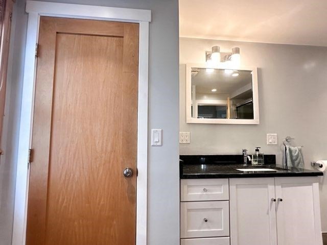 35 Parham Road Tyngsboro, MA 01879 - Photo 17 of 42 a bathroom with a sink and a mirror