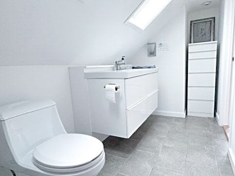 35 Parham Road Tyngsboro, MA 01879 - Photo 30 of 42 a bathroom with a sink a toilet and mirror