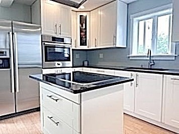 35 Parham Road Tyngsboro, MA 01879 - Photo 9 of 42 a kitchen with stainless steel appliances granite countertop a sink stove and refrigerator