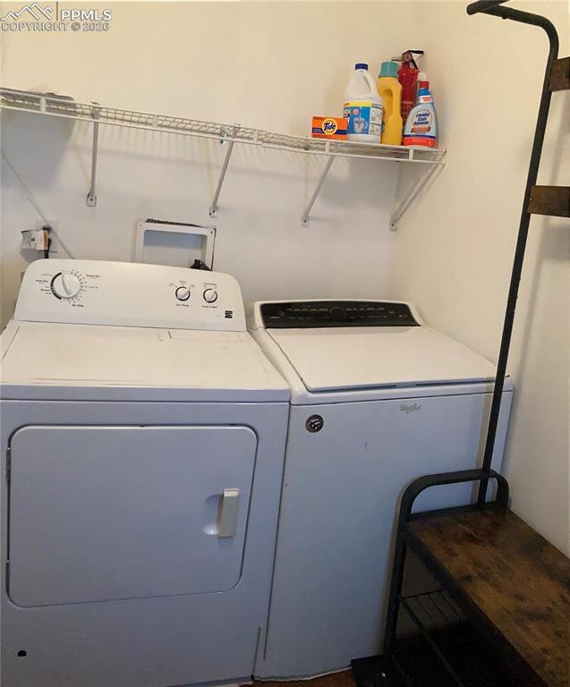 136 Black Knat Road Fairplay, CO 80440 - Photo 22 of 38 a utility room with dryer and washer
