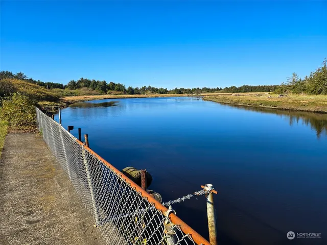 a view of a lake with sitting area