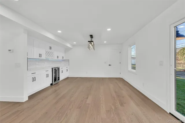 a large kitchen with stainless steel appliances kitchen island a large island in the center