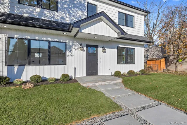 a view of a house with a garden
