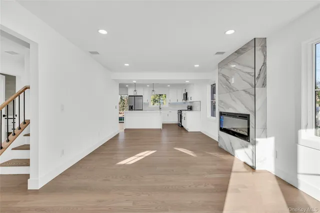 a view of a kitchen with furniture and a fireplace