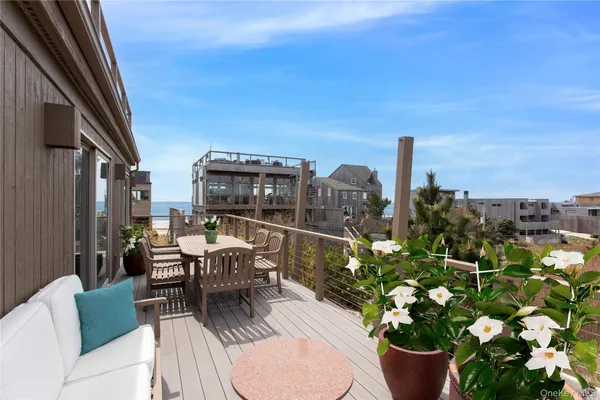 a view of a balcony with city view