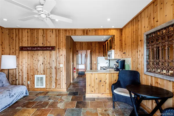 a kitchen with stainless steel appliances granite countertop a stove and a refrigerator