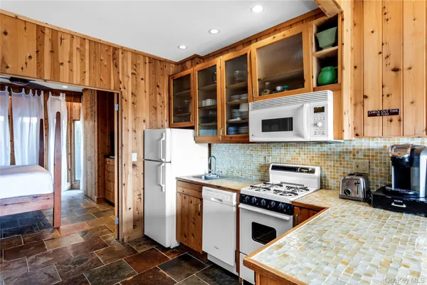 a bed room with a bed and a window