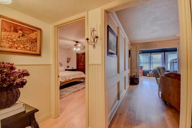 a view of a hallway view with living room
