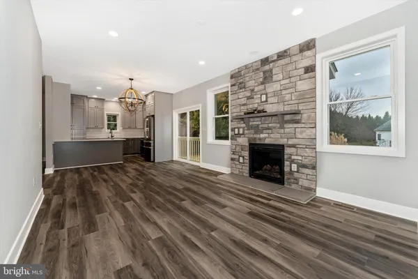 a view of a livingroom with a fireplace