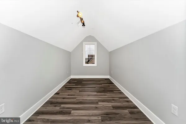 a view of a hallway with stairs