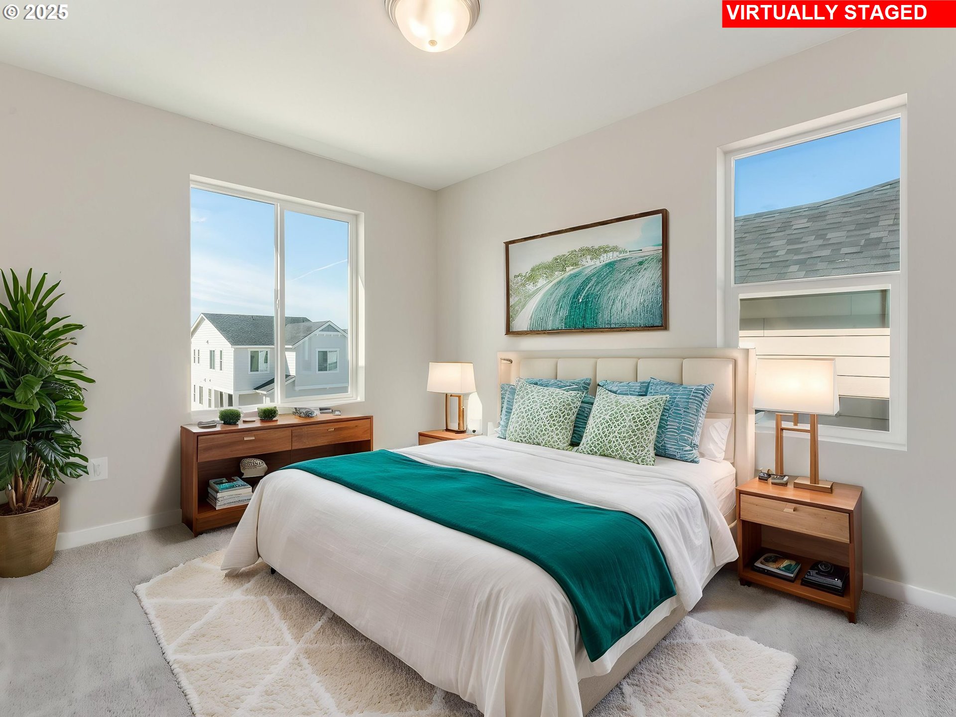 850 Northwest 178th Street Ridgefield, WA 98642 - Photo 44 of 48 a bedroom with a bed a table and a potted plant