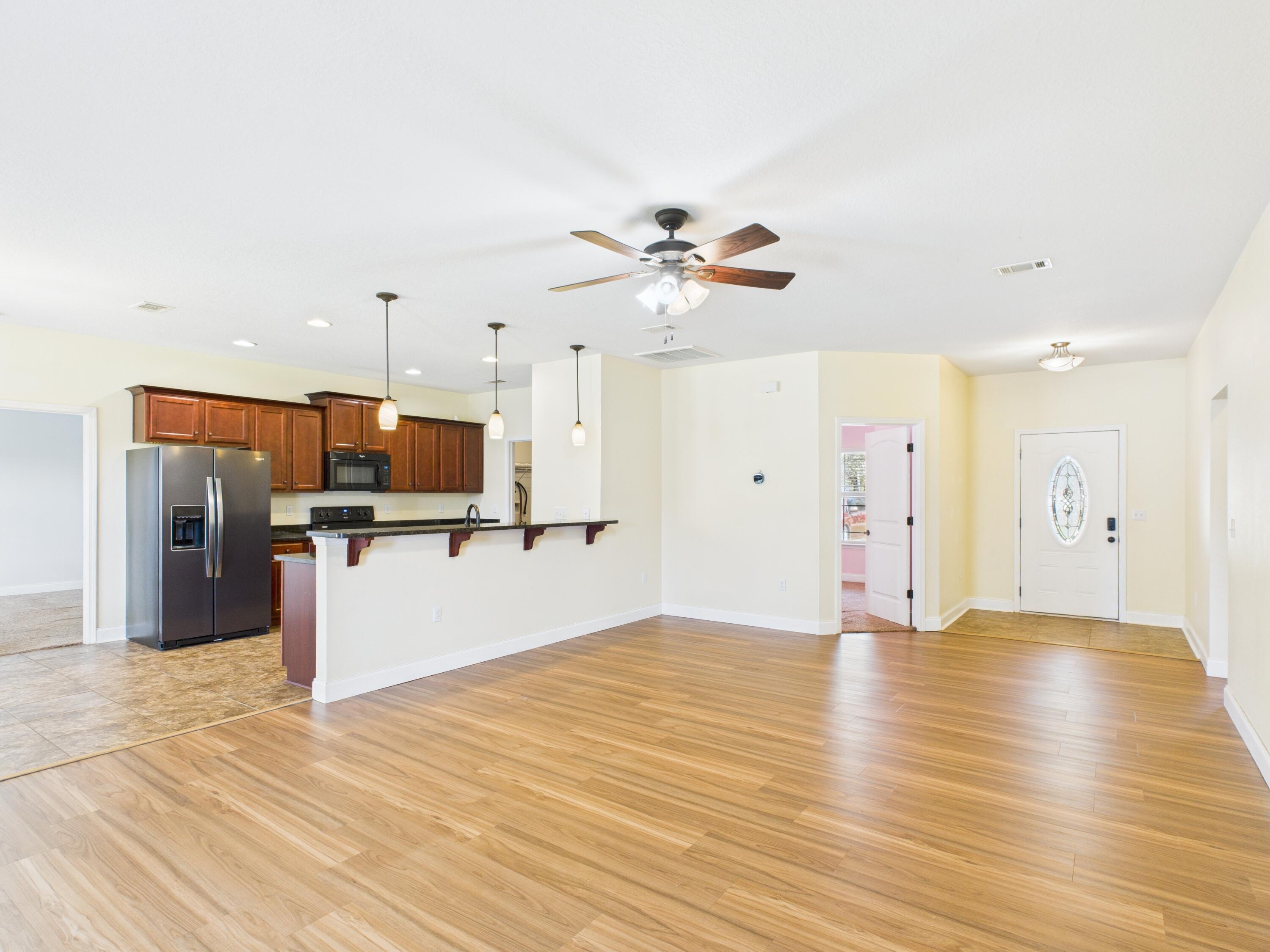 4546 Live Oak Church Road Crestview, FL 32539 - Photo 1 of 27 Living Area and Kitchen