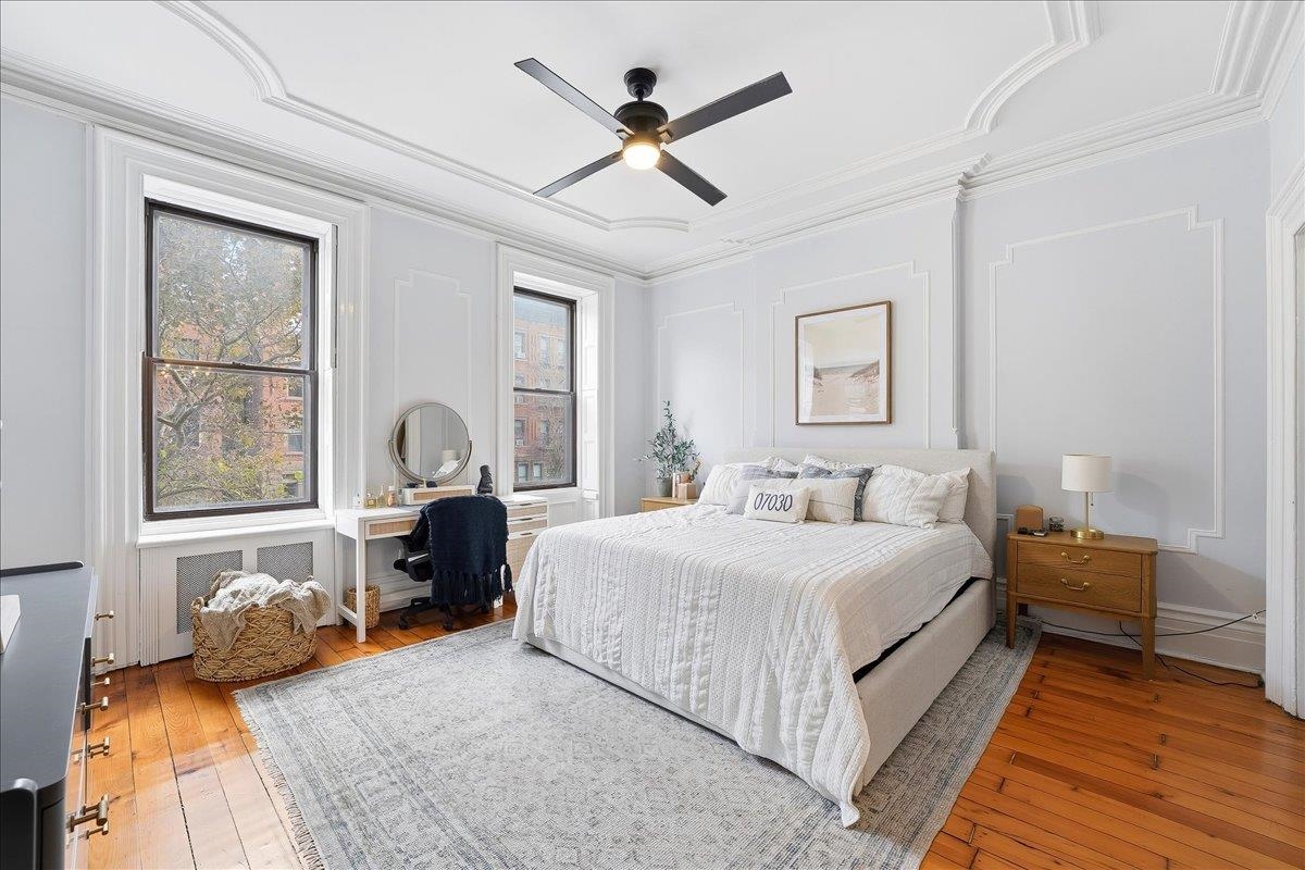 826 Washington Street, Unit 2 Hoboken, NJ 07030 - Photo 20 of 42 a bedroom with bed and a window