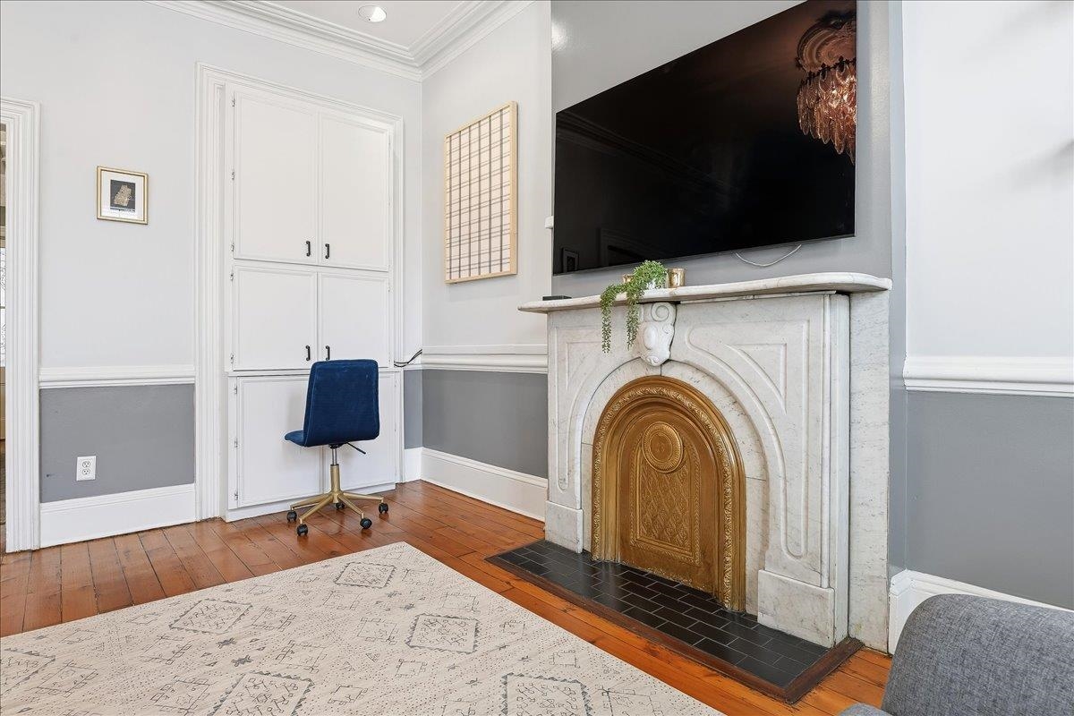 826 Washington Street, Unit 2 Hoboken, NJ 07030 - Photo 7 of 42 a view of living room with flat screen tv and washer