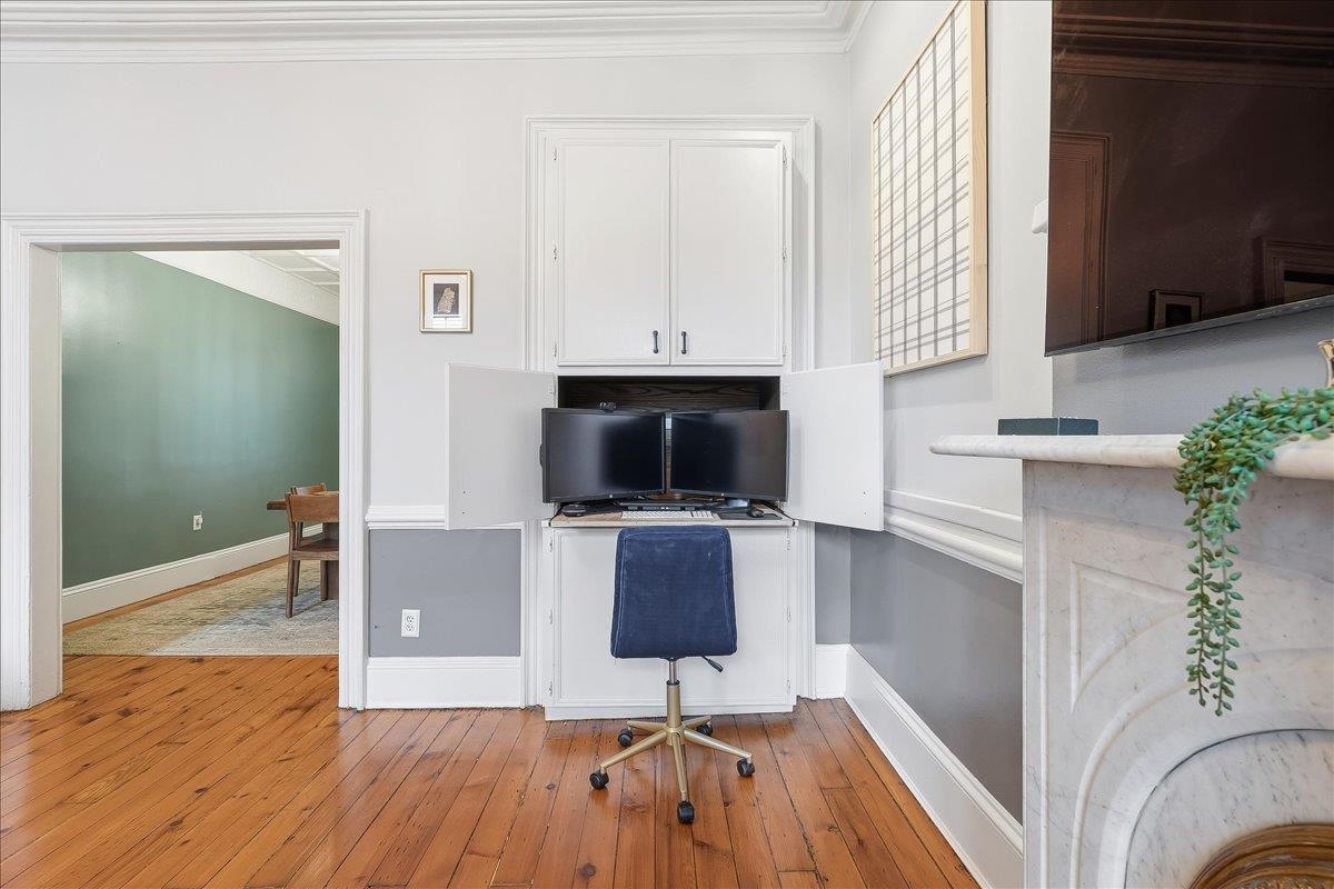 826 Washington Street, Unit 2 Hoboken, NJ 07030 - Photo 9 of 42 a living room with furniture and a flat screen tv