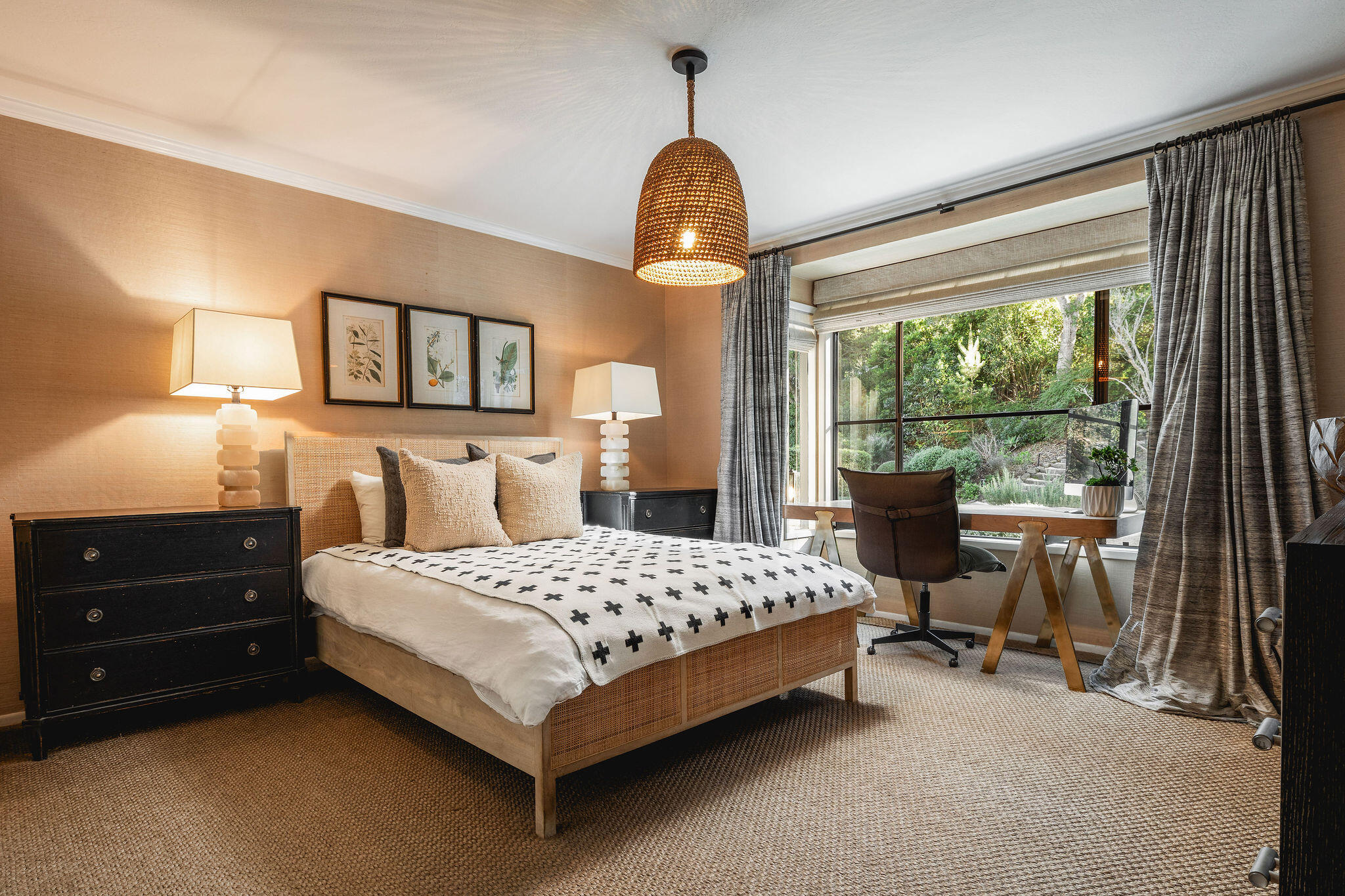 395 Woodley Road Montecito, CA 93108 - Photo 16 of 30 a bedroom with a bed a table and large windows