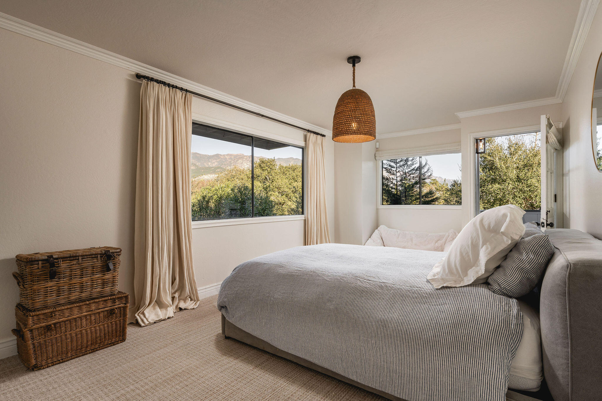 395 Woodley Road Montecito, CA 93108 - Photo 19 of 30 a bedroom with a bed and a window