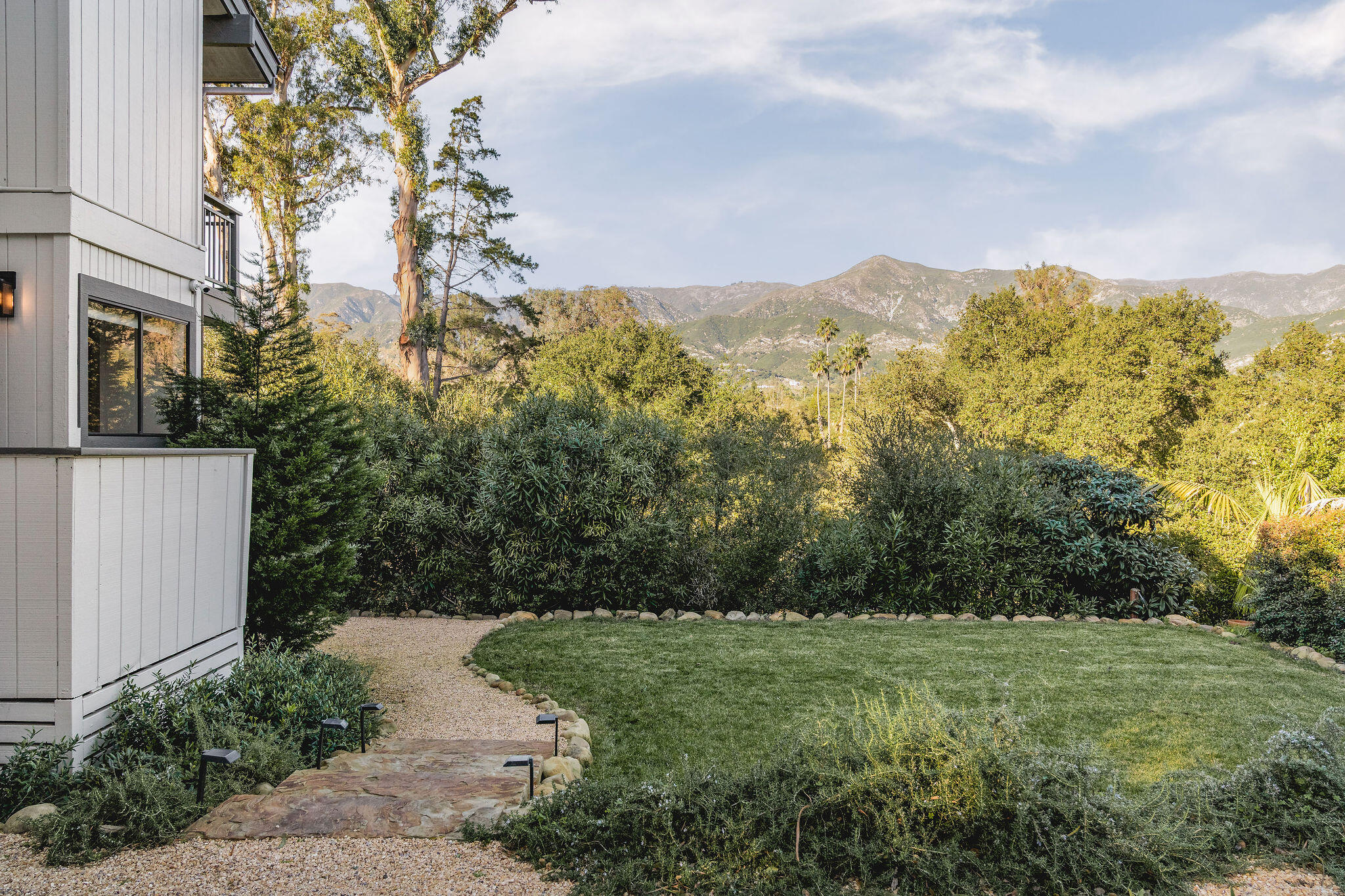 395 Woodley Road Montecito, CA 93108 - Photo 26 of 30 a view of a yard with an trees