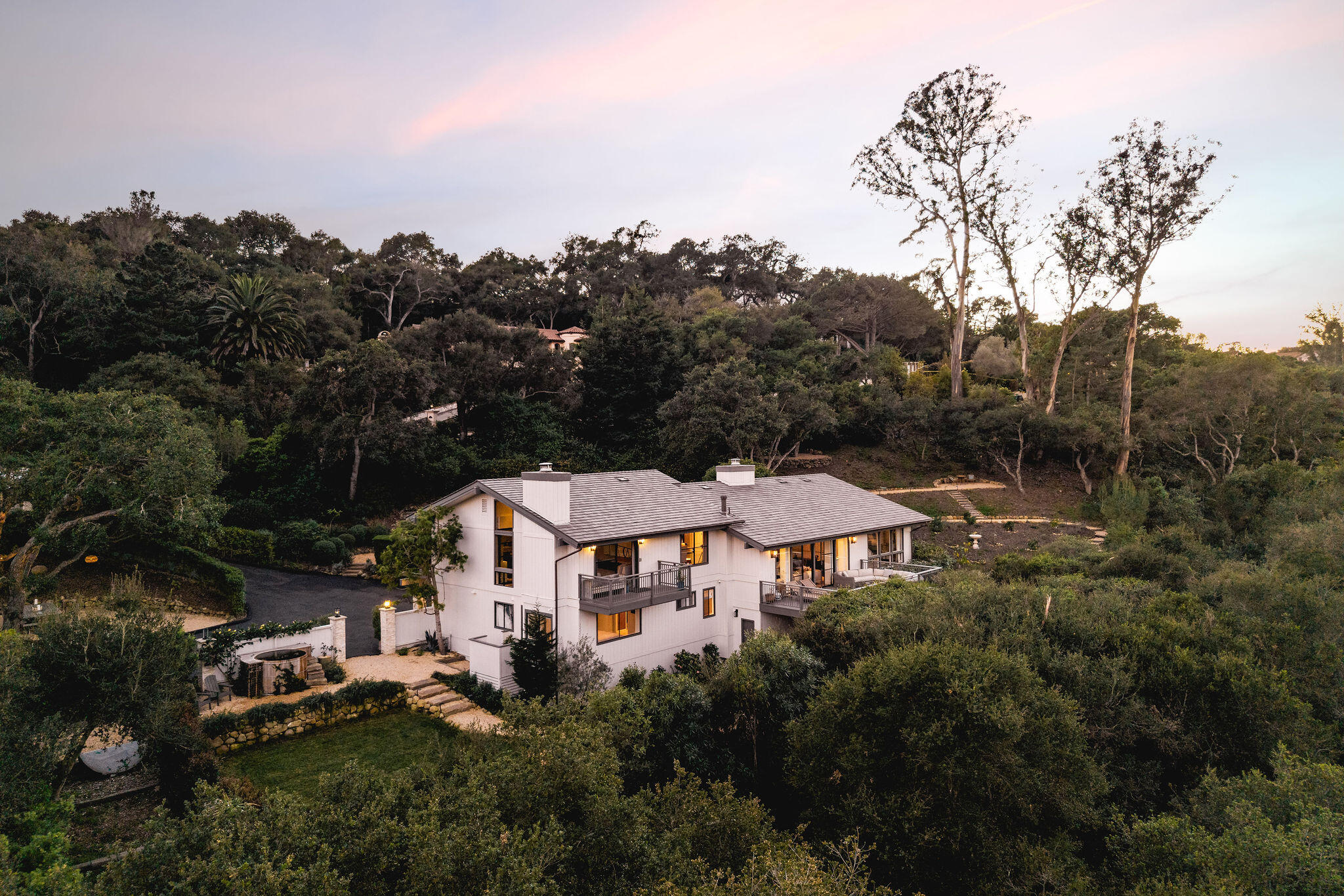 395 Woodley Road Montecito, CA 93108 - Photo 29 of 30 an aerial view of a house with yard and trees in the background