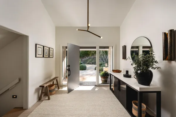 a living room with fireplace furniture and a flat screen tv
