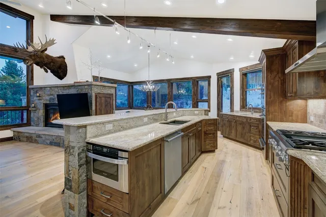a kitchen with a stove and a microwave