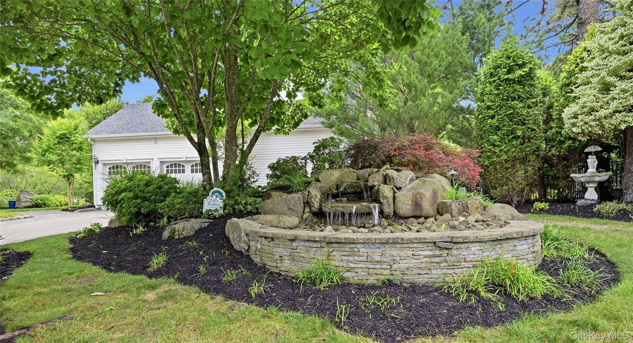 6 Thunder Road Miller Place, NY 11764 - Photo 7 of 50 Another View Of The Stunning, Meticulously Landscaped Property Which Is Wrapped In Stone Walls, Rocks, Boulders, Paver Stones & Also Offers A Spectacular Custom Stone And Boulder Waterfall On The Side Of The Property
