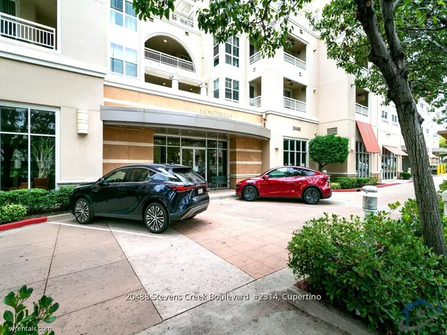 a car parked in front of a building