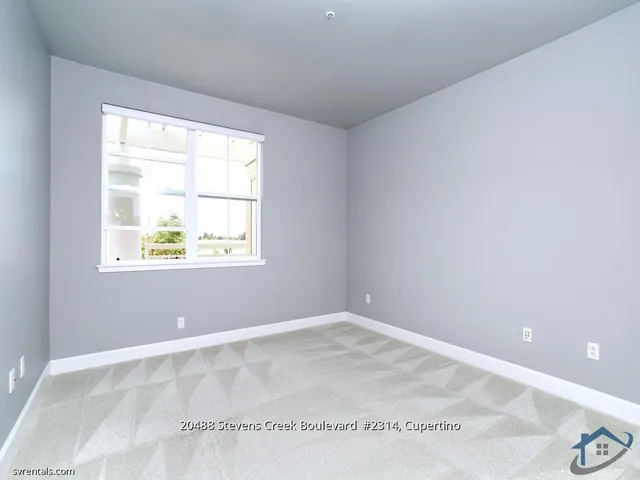 an empty room with a window