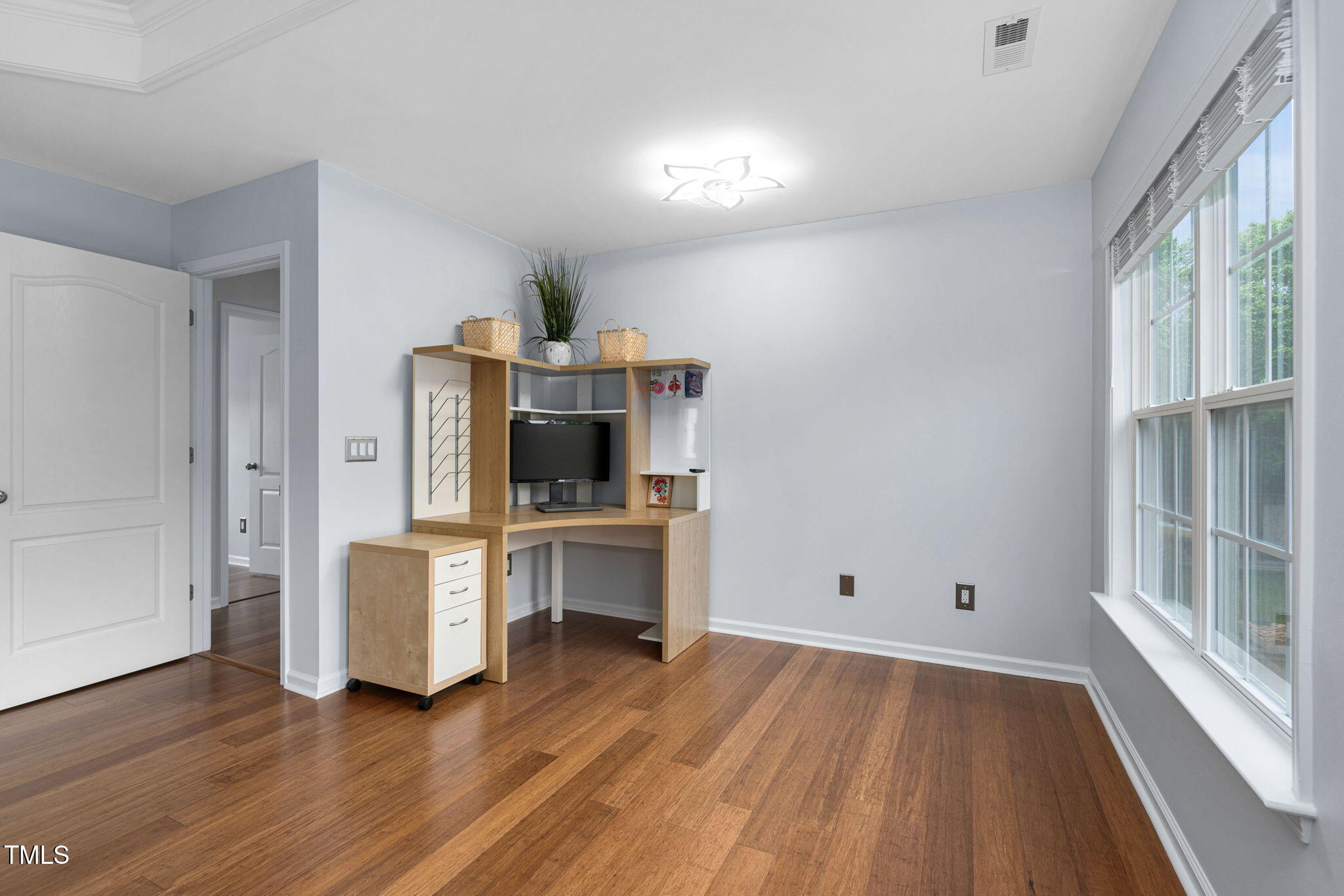 7612 Vista Del Rey Lane Raleigh, NC 27613 - Photo 35 of 73 Primary Bedroom Sitting Area Next To Wall of Windows