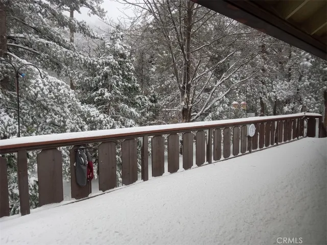 a view of balcony with wooden floor