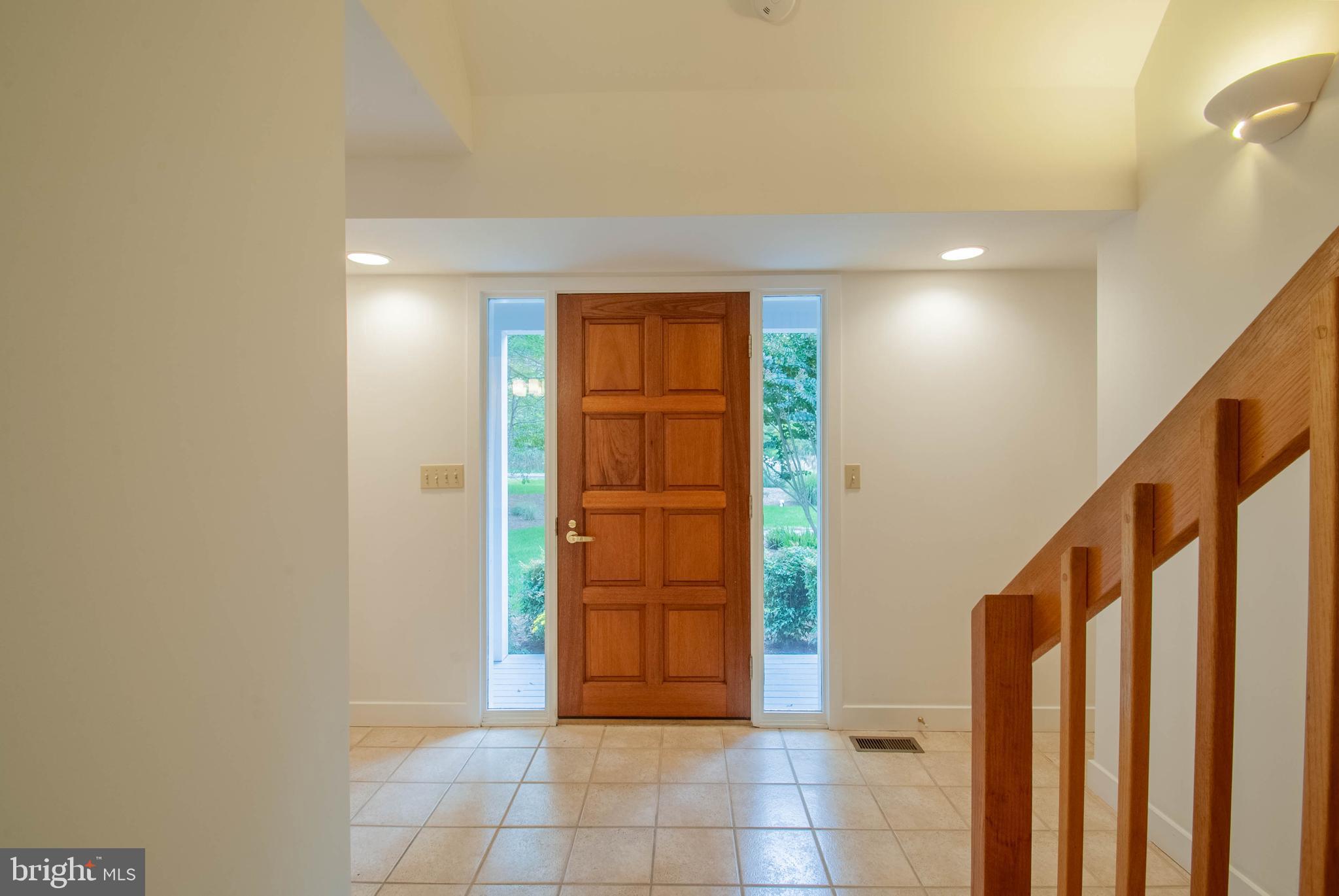 3672 Thomas Point Road Annapolis, MD 21403 - Photo 5 of 57 Solid wood front door with sidelights, tiled foyer
