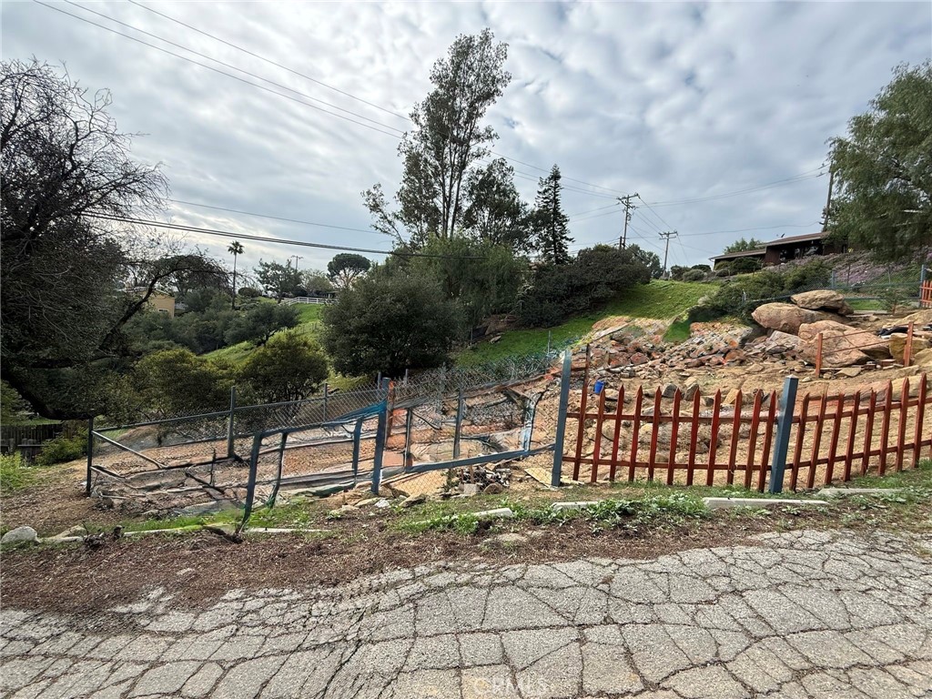 7365 Webb Road Chatsworth, CA 91311 - Photo 12 of 12 a view of a yard with plants and a bench