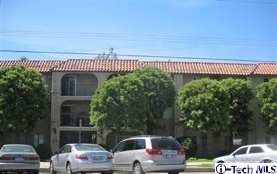 3010 Montrose, Unit 33 La Crescenta, CA 91214 - Photo 1 of 11 a view of a couches and table in the patio