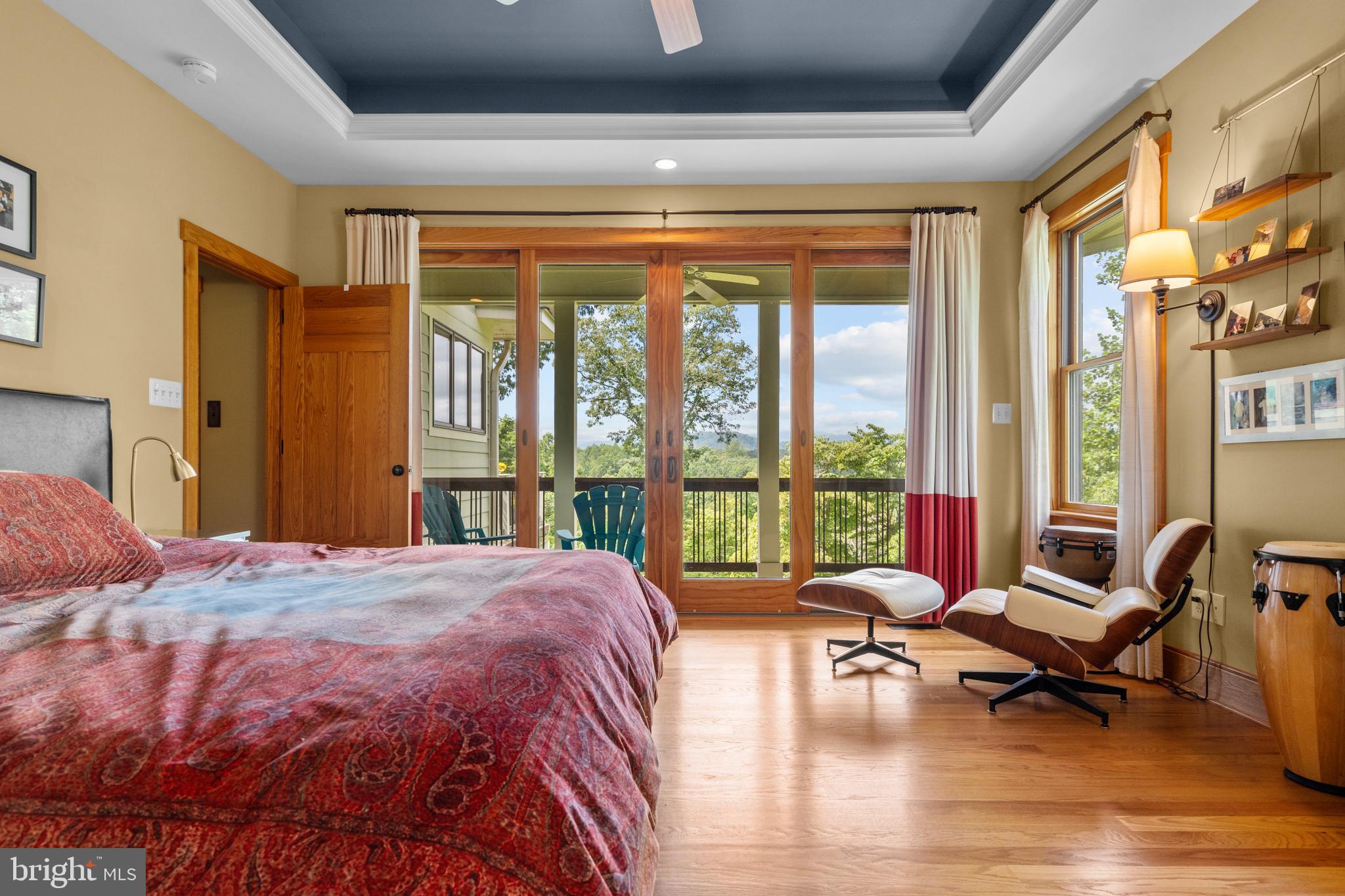 210 Grandview Road Washington, VA 22747 - Photo 20 of 62 a spacious bedroom with a bed and glass window