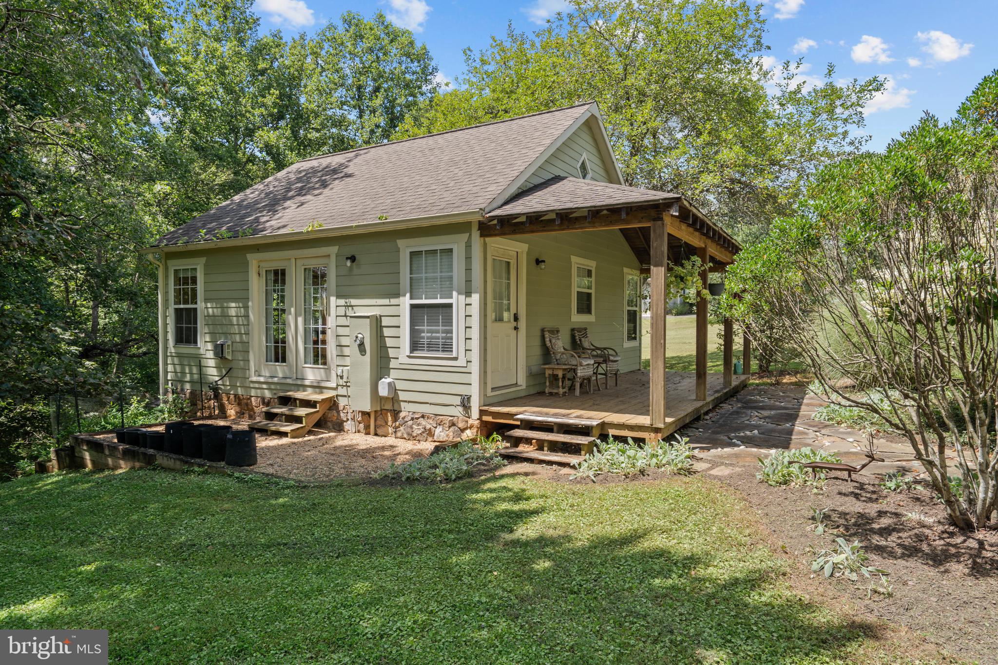 210 Grandview Road Washington, VA 22747 - Photo 3 of 62 a view of a house with backyard porch and sitting area