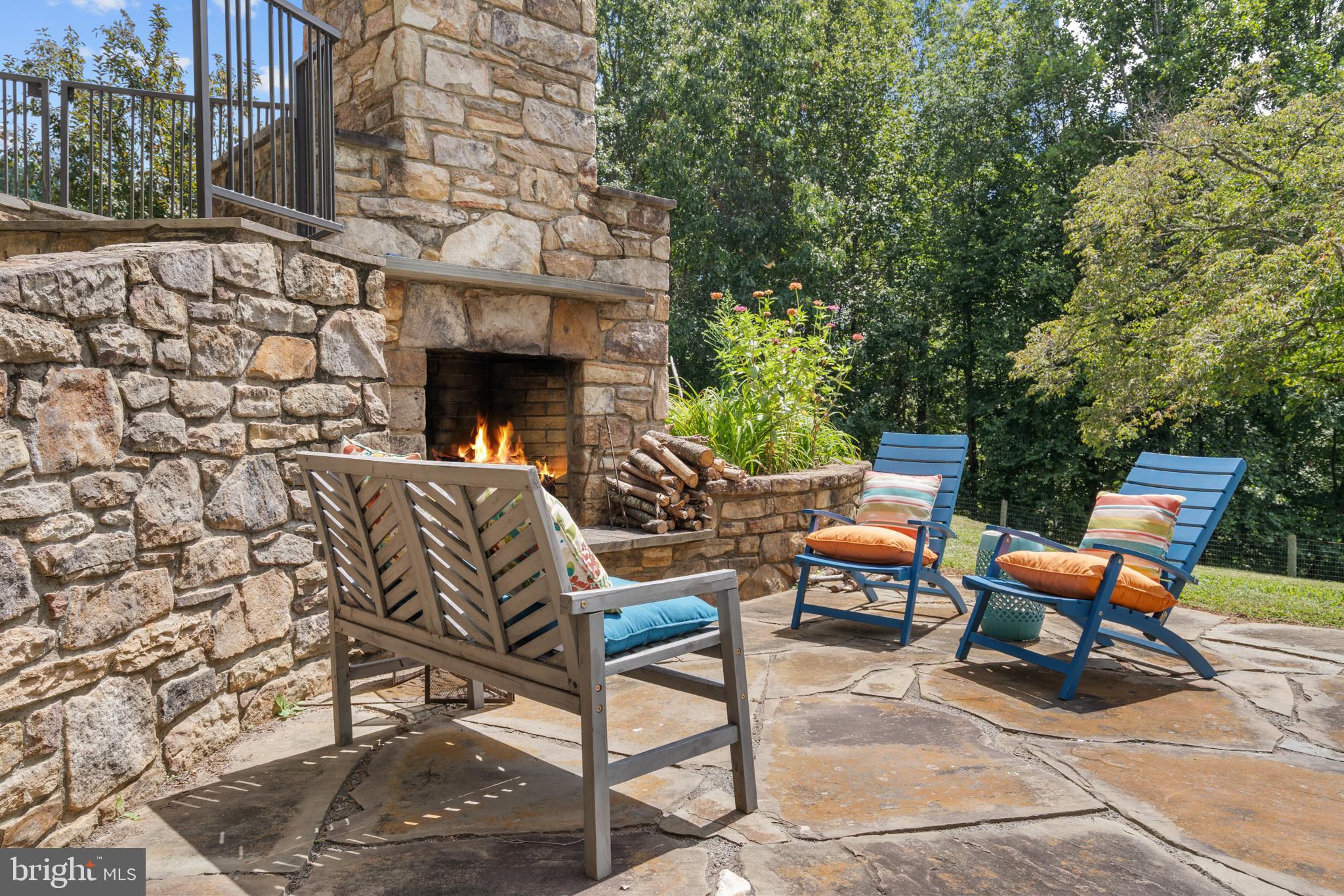 210 Grandview Road Washington, VA 22747 - Photo 43 of 62 a view of a chairs and table in the back yard of the building