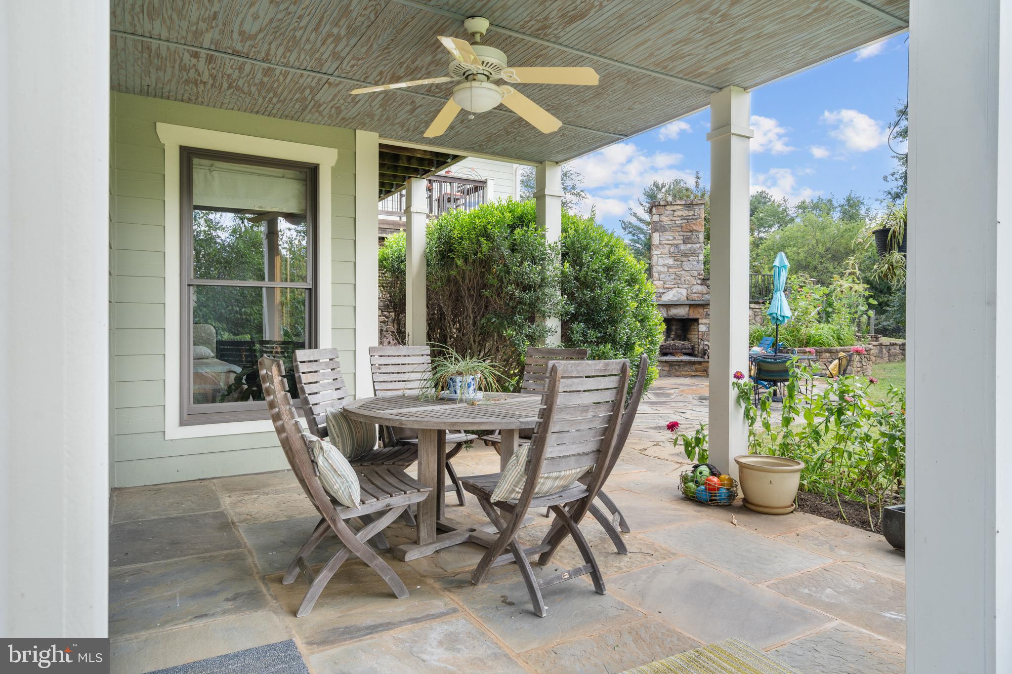 210 Grandview Road Washington, VA 22747 - Photo 46 of 62 a view of an outdoor dining space with a table and chairs