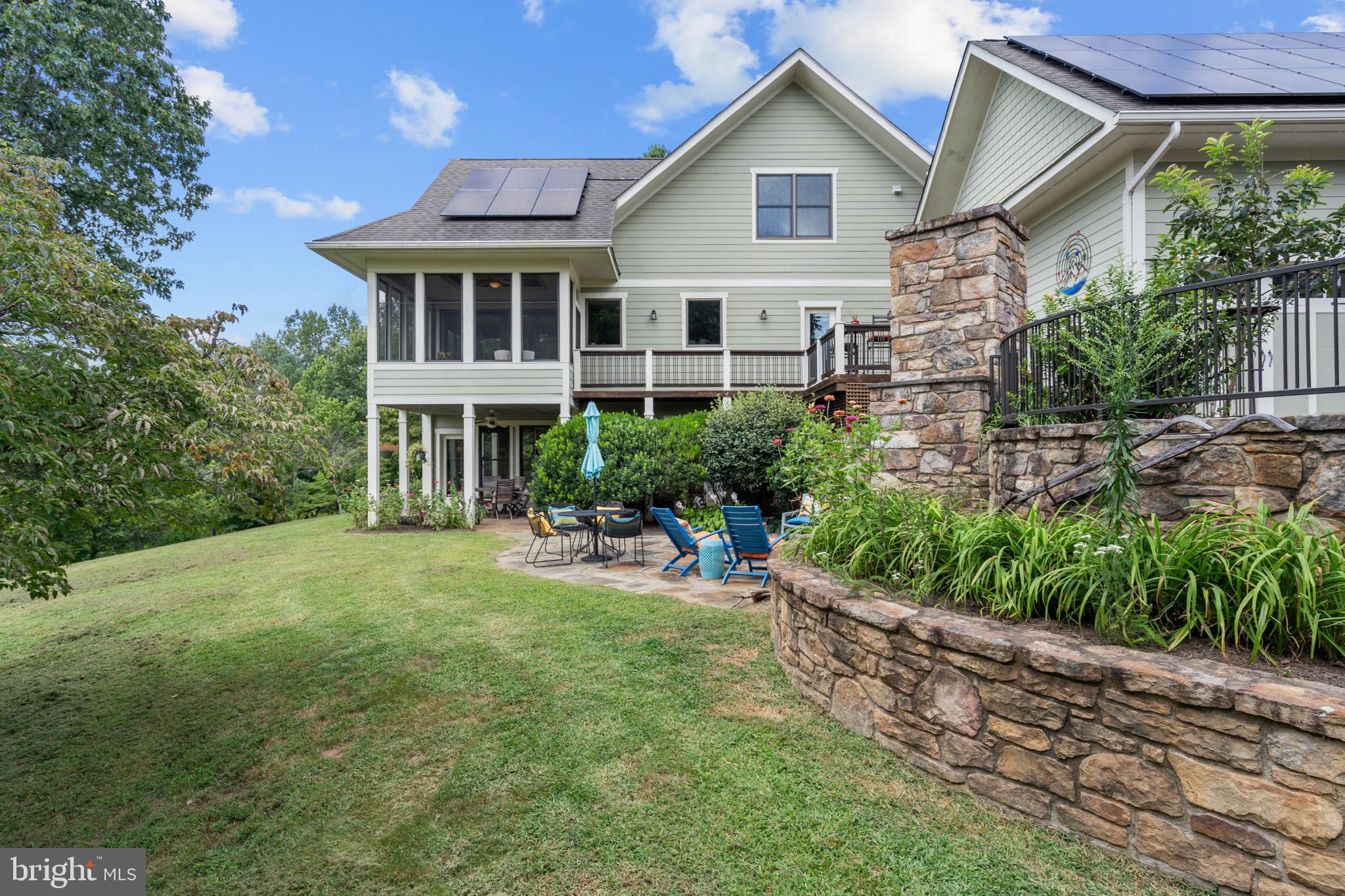 210 Grandview Road Washington, VA 22747 - Photo 51 of 62 a view of a house with a yard and sitting area