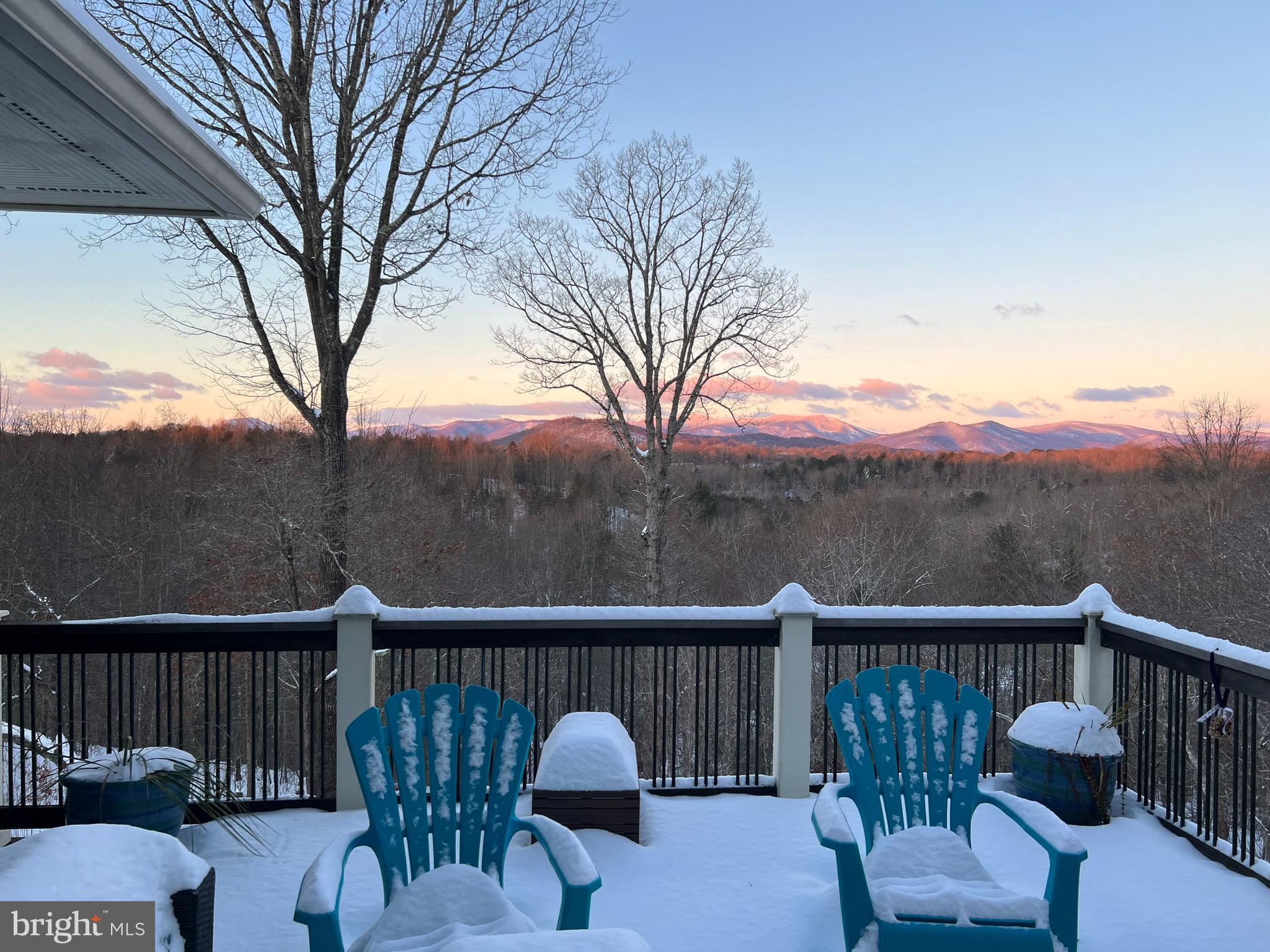210 Grandview Road Washington, VA 22747 - Photo 57 of 62 a view of a balcony with couches and wooden fence