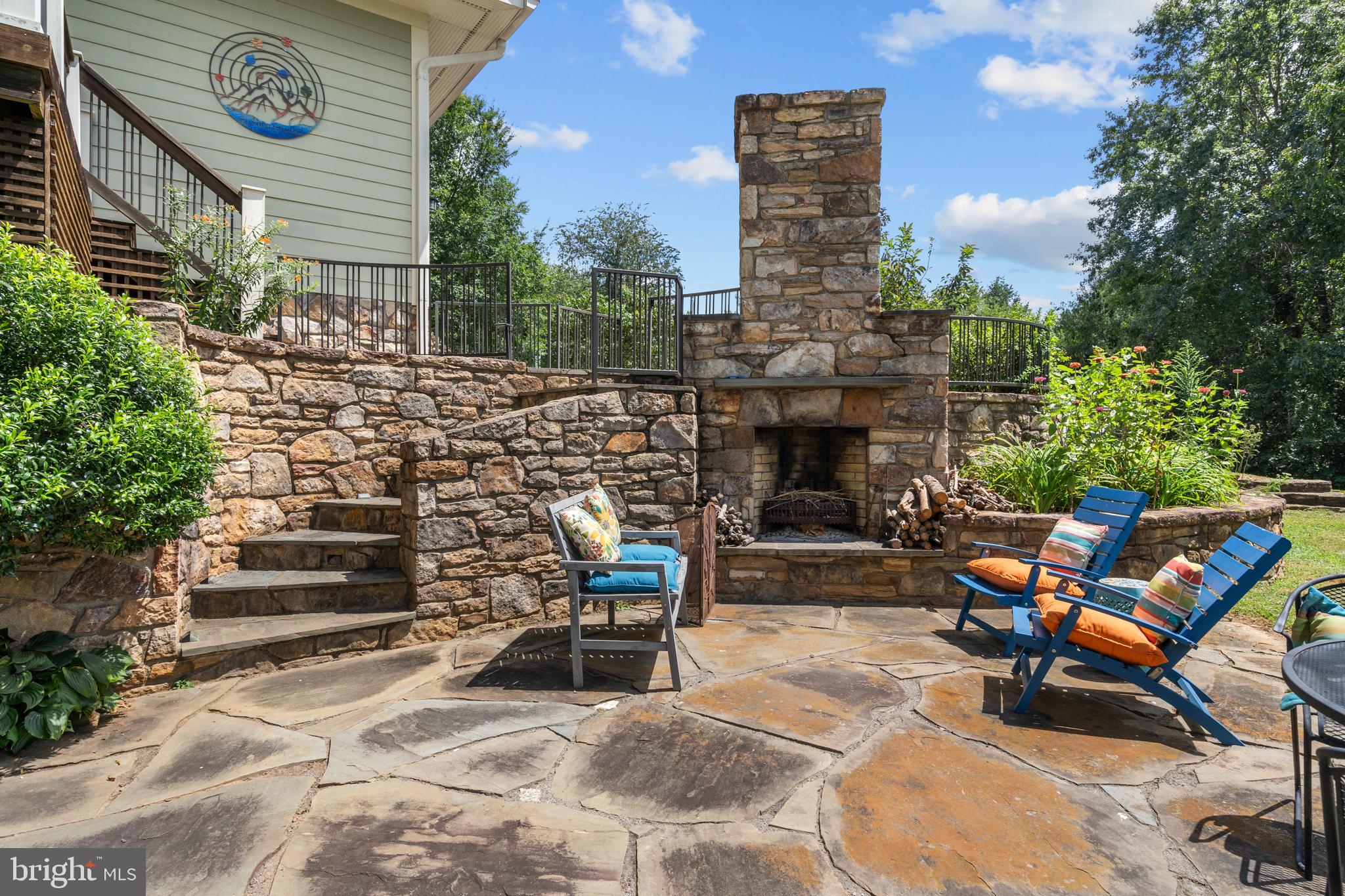 210 Grandview Road Washington, VA 22747 - Photo 6 of 62 a building outdoor space with patio furniture and a fireplace