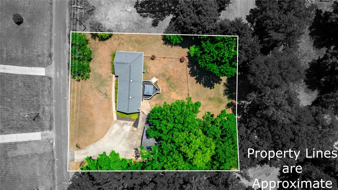 1815 Pearman Dairy Road Anderson, SC 29625 - Photo 28 of 35 An aerial perspective reveals the property's footprint and surrounding landscape.