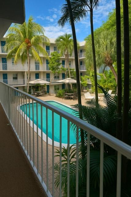 1407 Northeast 56th Street, Unit 217 Fort Lauderdale, FL 33334 - Photo 1 of 8 a view of a balcony with lake view