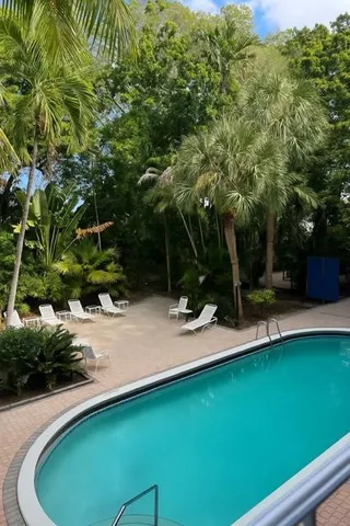 a view of a backyard with a patio