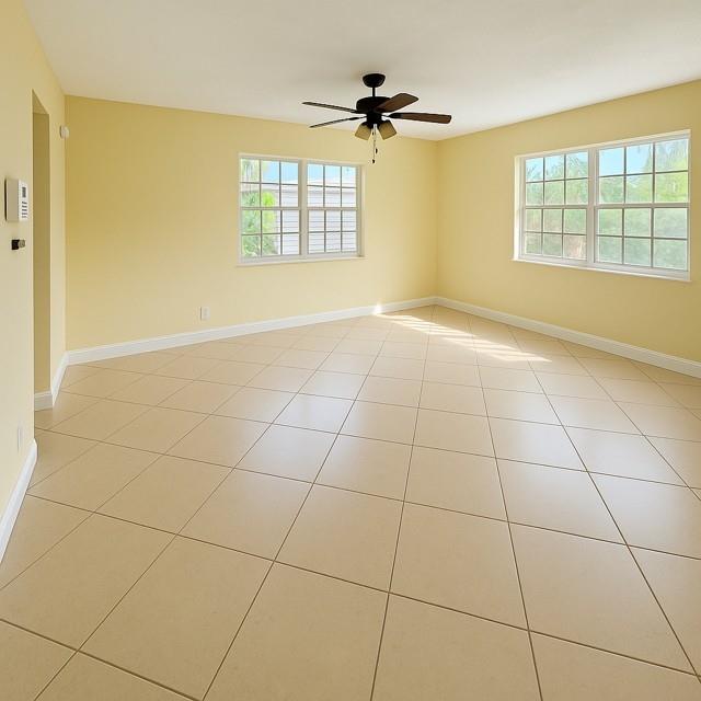 1407 Northeast 56th Street, Unit 217 Fort Lauderdale, FL 33334 - Photo 4 of 8 a view of an empty room with a window