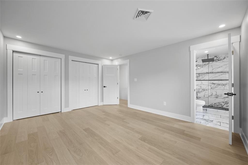 134 Kings Creek Road Georgetown, PA 15043 - Photo 18 of 44 a view of an empty room and wooden floor