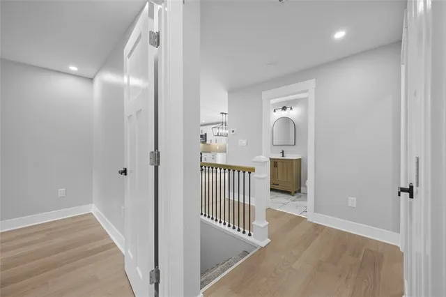 a view of a hallway view with staircase