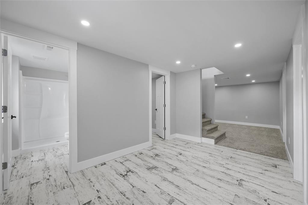 134 Kings Creek Road Georgetown, PA 15043 - Photo 27 of 44 a view of a big room with wooden cabinet and mirror