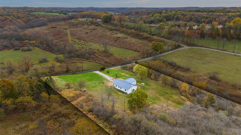 134 Kings Creek Road Georgetown, PA 15043 - Photo 43 of 44 an aerial view of a house with a yard