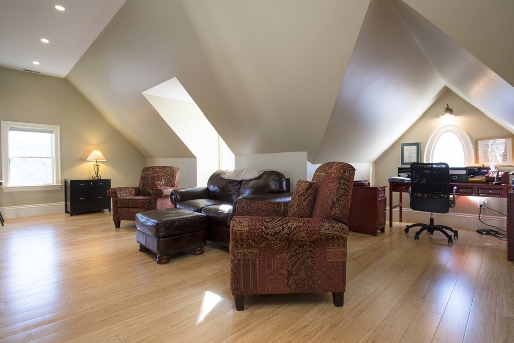 155 Eastbourne Road Newton, MA 02459 - Photo 13 of 25 a living room with furniture and a wooden floor
